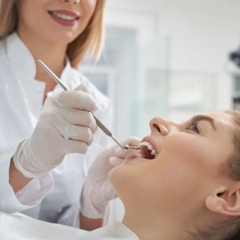 Welcoming Science-Based Dental Care A mindful woman exploring dental care research materials